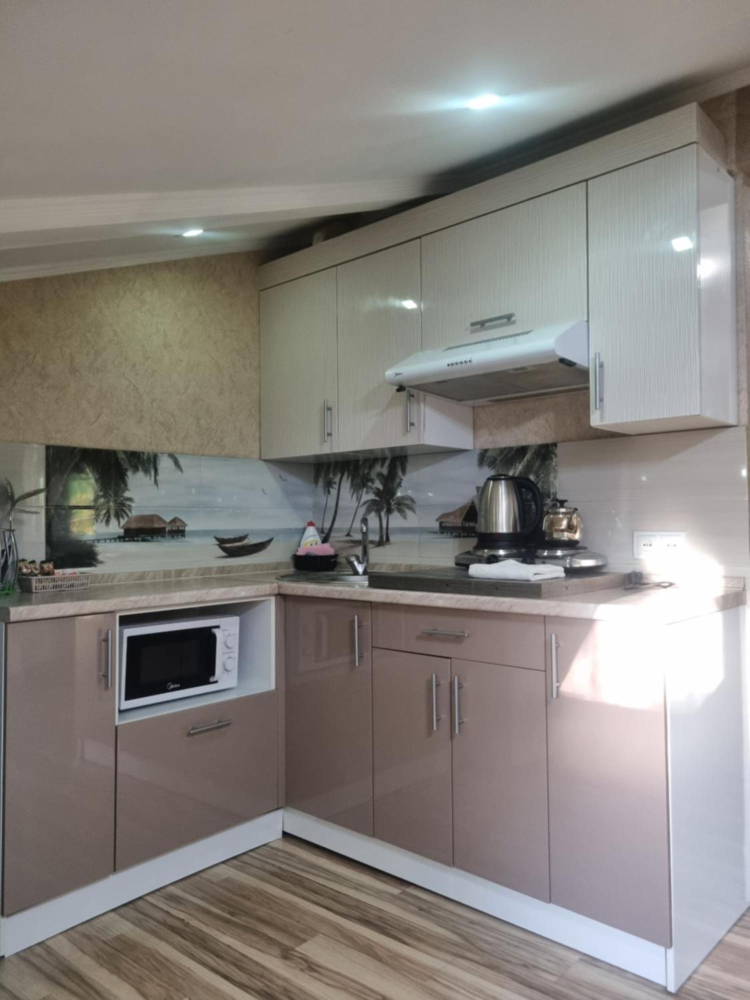 Apartments On Mustafa Ozturk Almaty Bagian luar foto