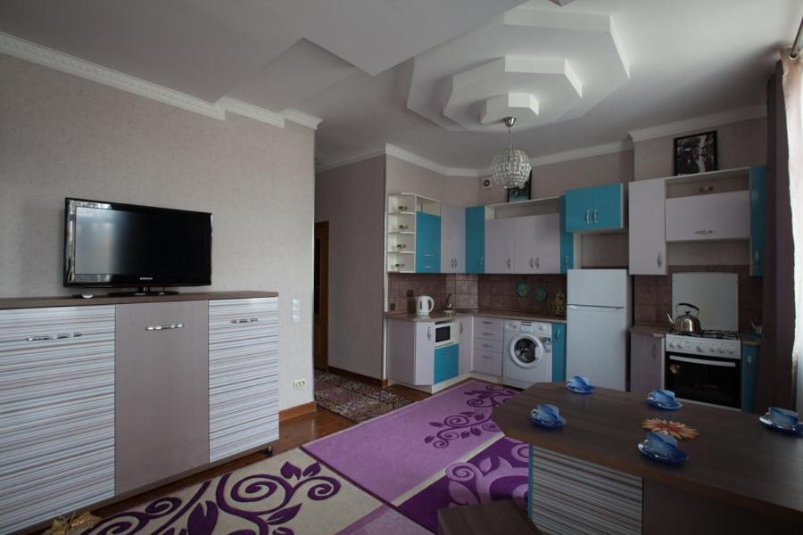 Apartments On Mustafa Ozturk Almaty Bagian luar foto